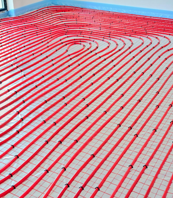 Installation de plancher chauffant Pose d’un réseau de plancher chauffant avant chape pour une installation de chauffage